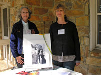 Gail McDowell and Anne Schafer with a photo of their parents, Dean and Mary McDowell